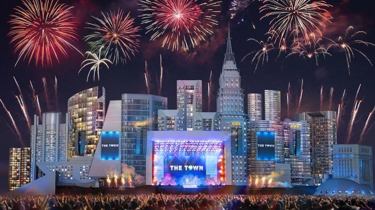 Mulher suspendida em tirolesa causa surpresa durante performance do The Town