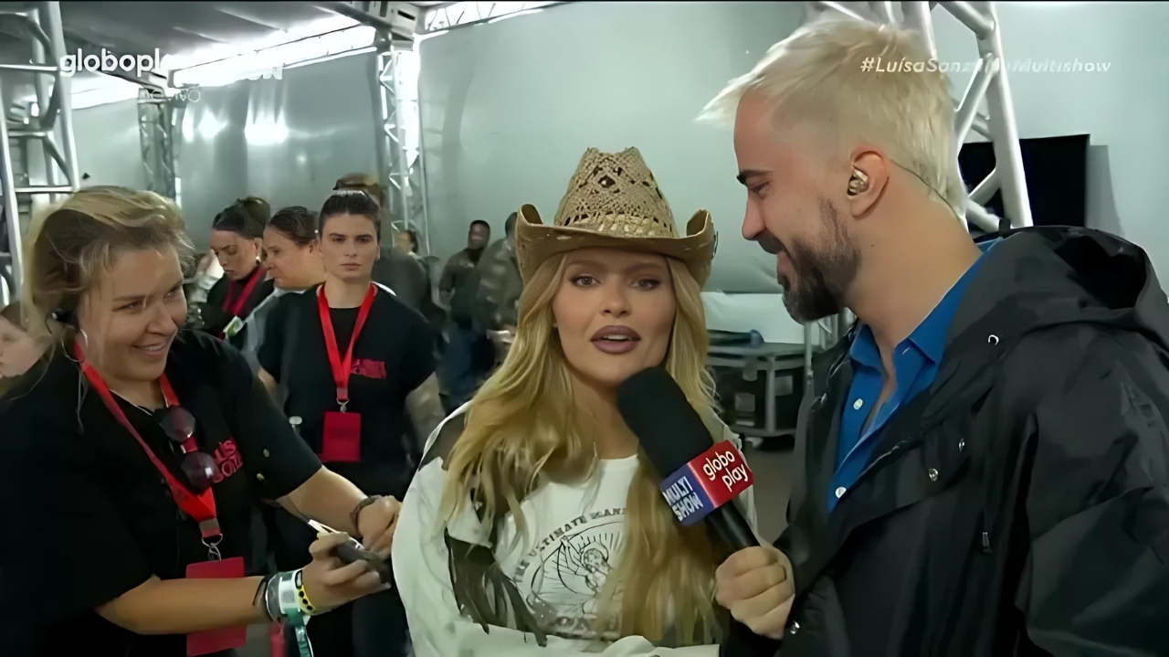 Luísa Sonza reconhece repórter ao vivo no Lollapalooza e questiona crítica sobre “batalhas de gritos” com Demi Lovato